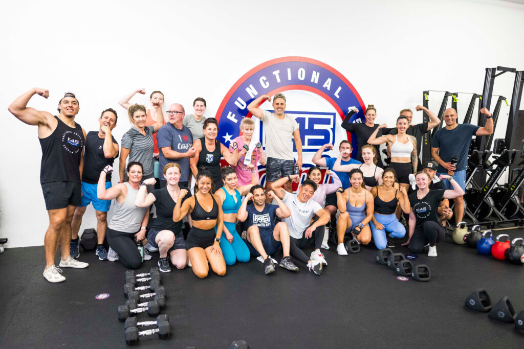 Participants engaged in an F45 Training session at the Camarillo studio, experiencing high-intensity interval training and strength exercises.