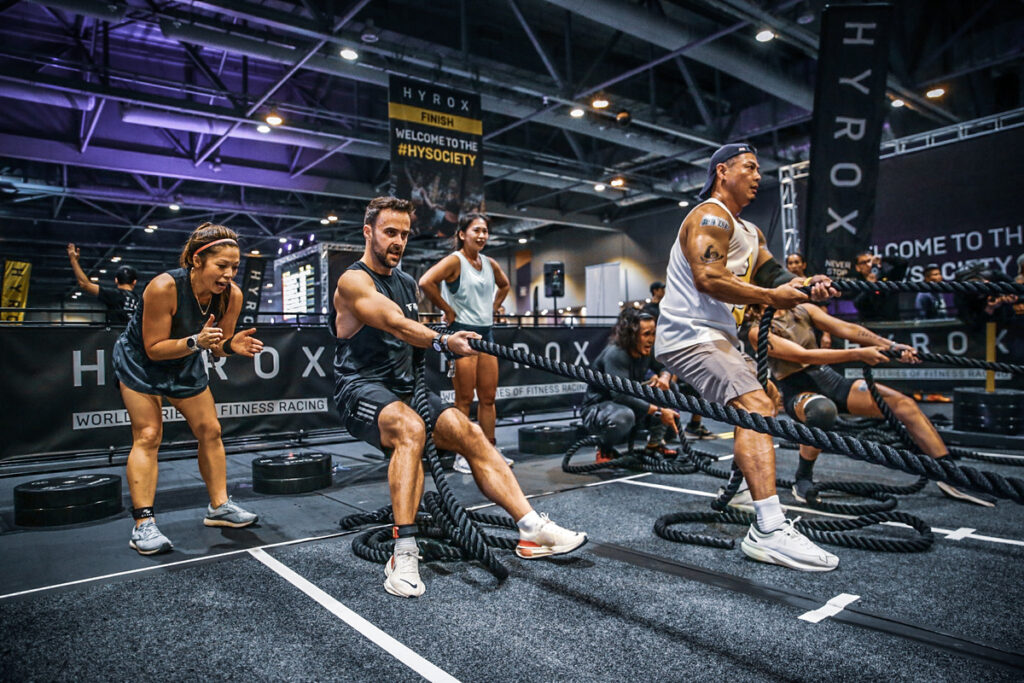 Athlete pushing a sled during a Hyrox training session at F45 Camarillo.