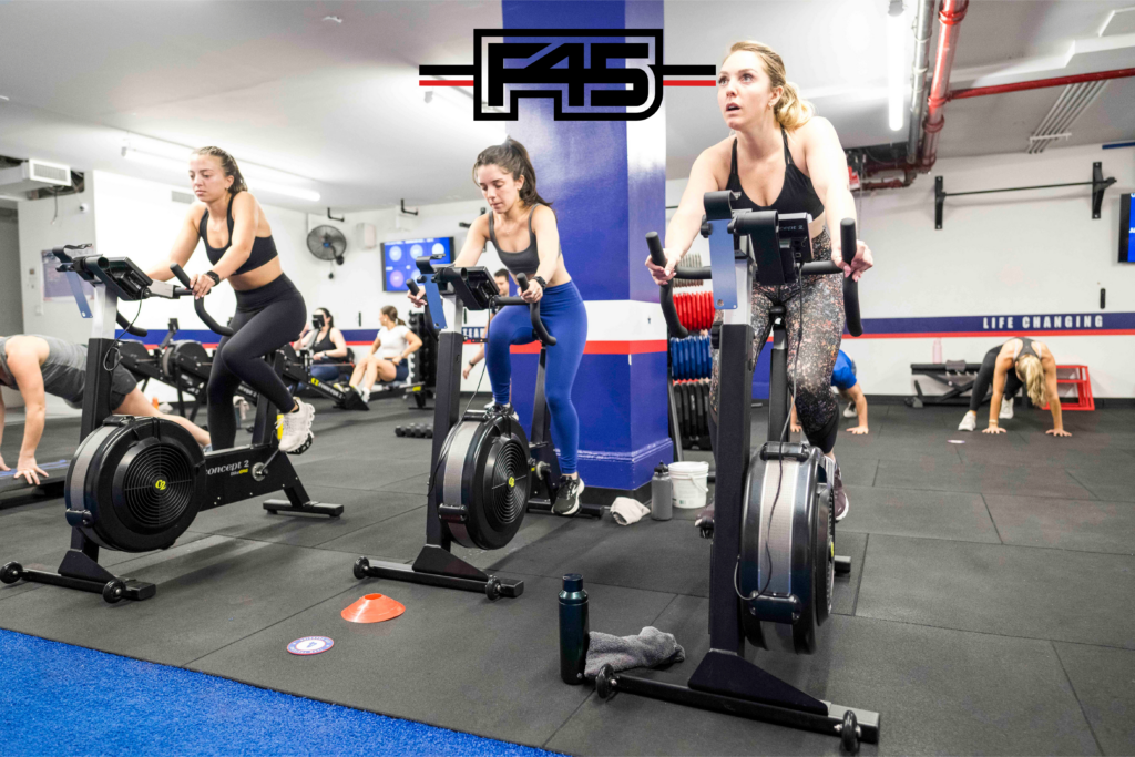 People engaging in a functional training circuit workout at F45 Thousand Oaks